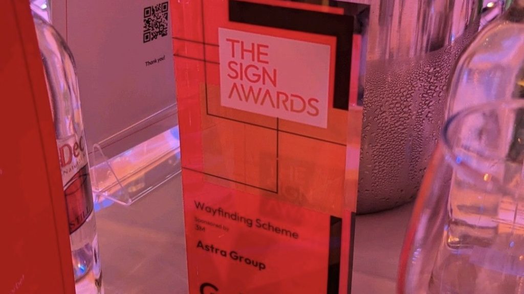 close up of The Sign Awards wayfinding award on a table